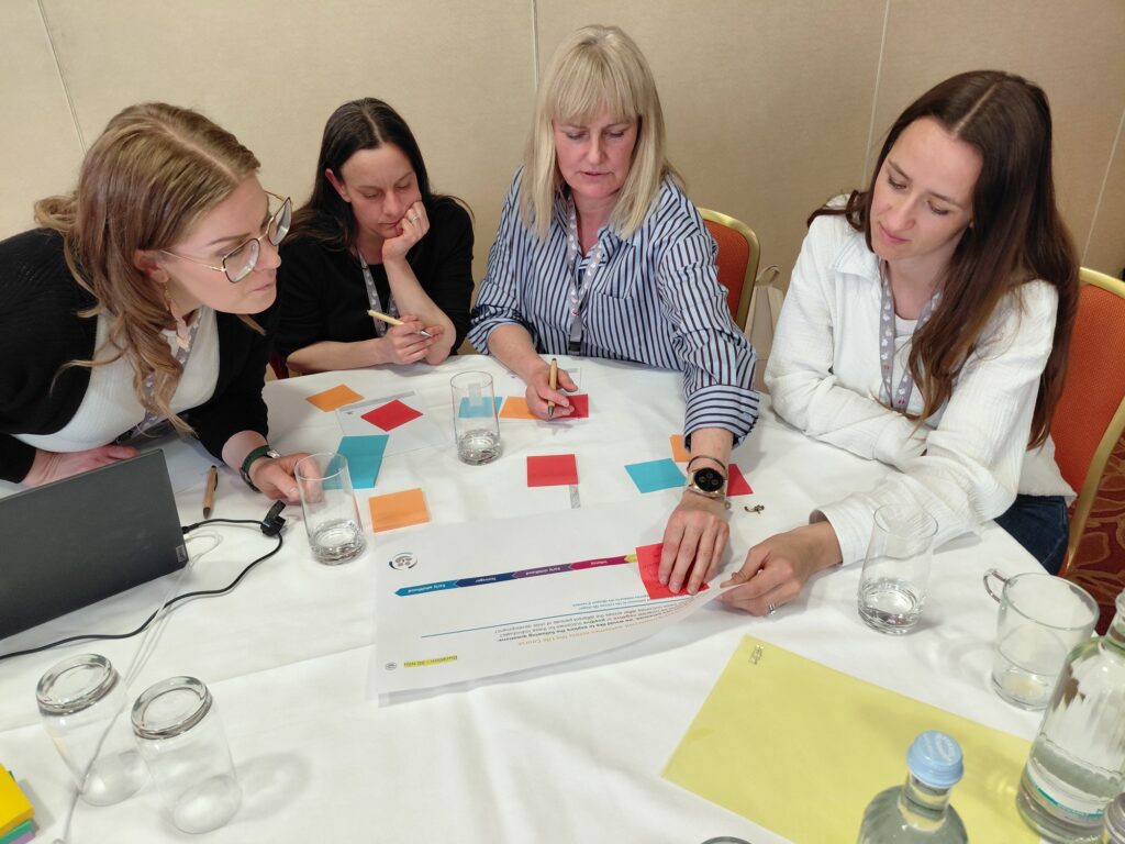 Participants using Post-its during the IMPROVE PRETERM very preterm birth research workshop